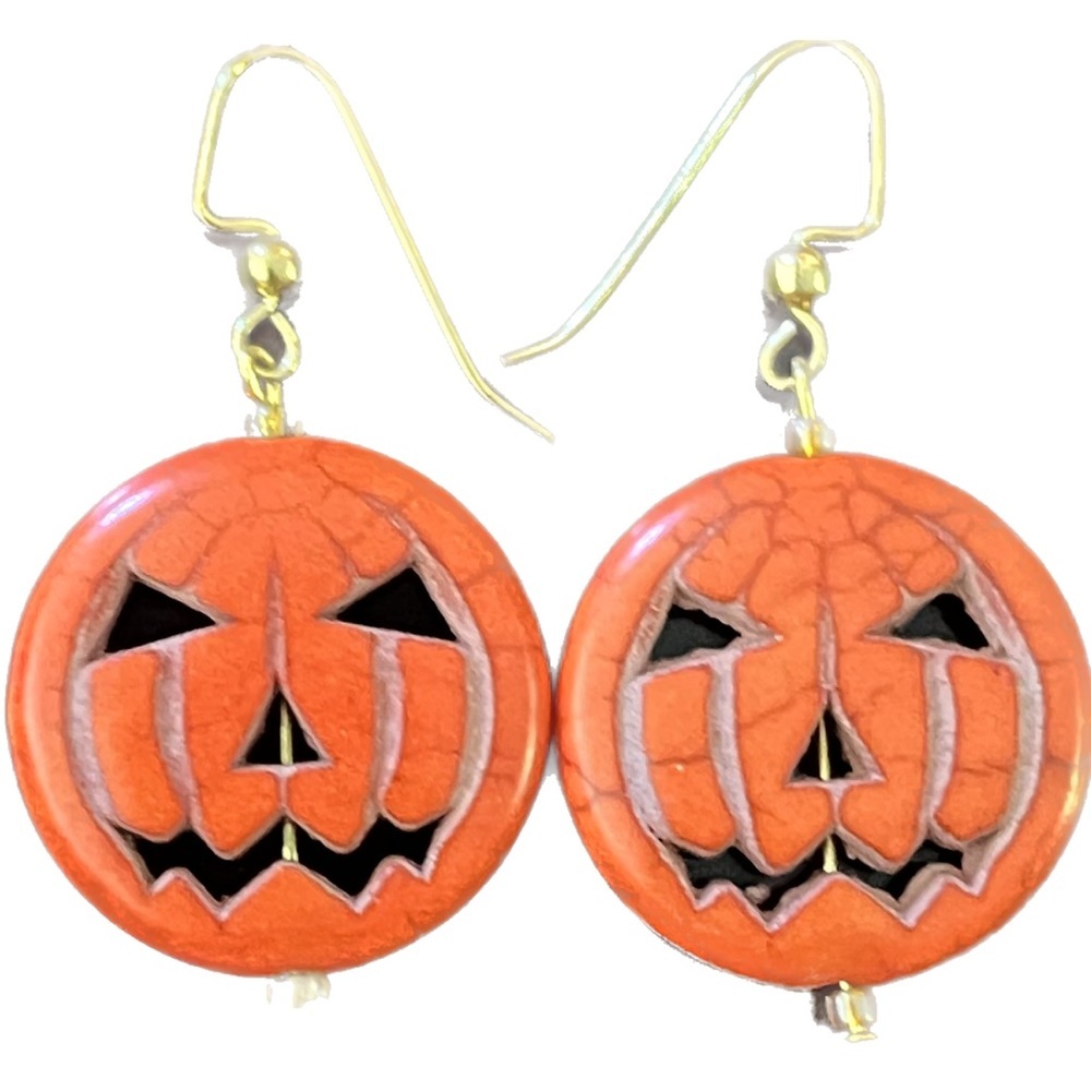 Cute orange pumpkin earrings with gold findings.